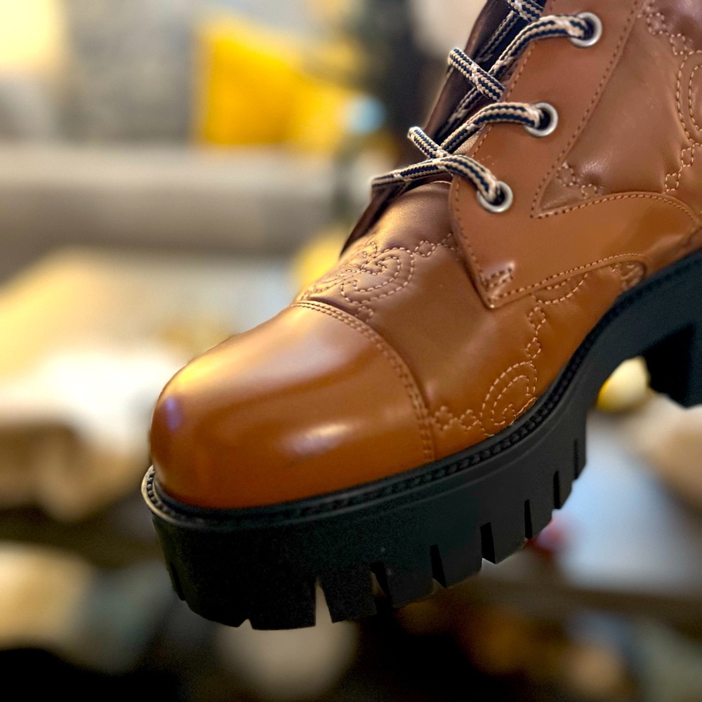 Gucci Women’s GG Quilted Platform Combat Boots